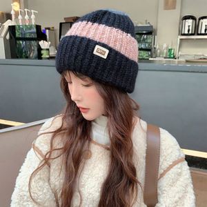 Женская зимняя трикотажная шапка-ушанка - Product Image 4