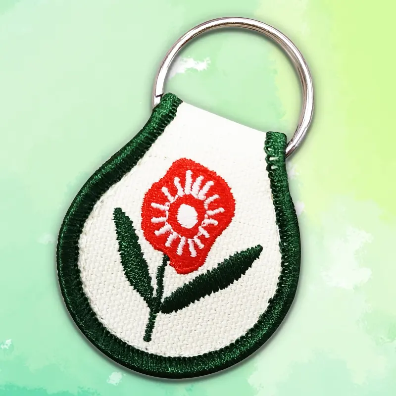 Kualitas tinggi kustom Logo bordir gantungan kunci kain gantungan kunci Patch dengan bunga