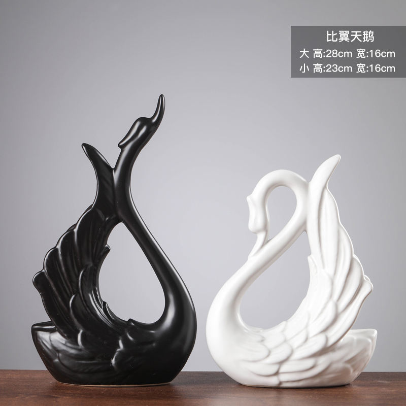 Swans flying together