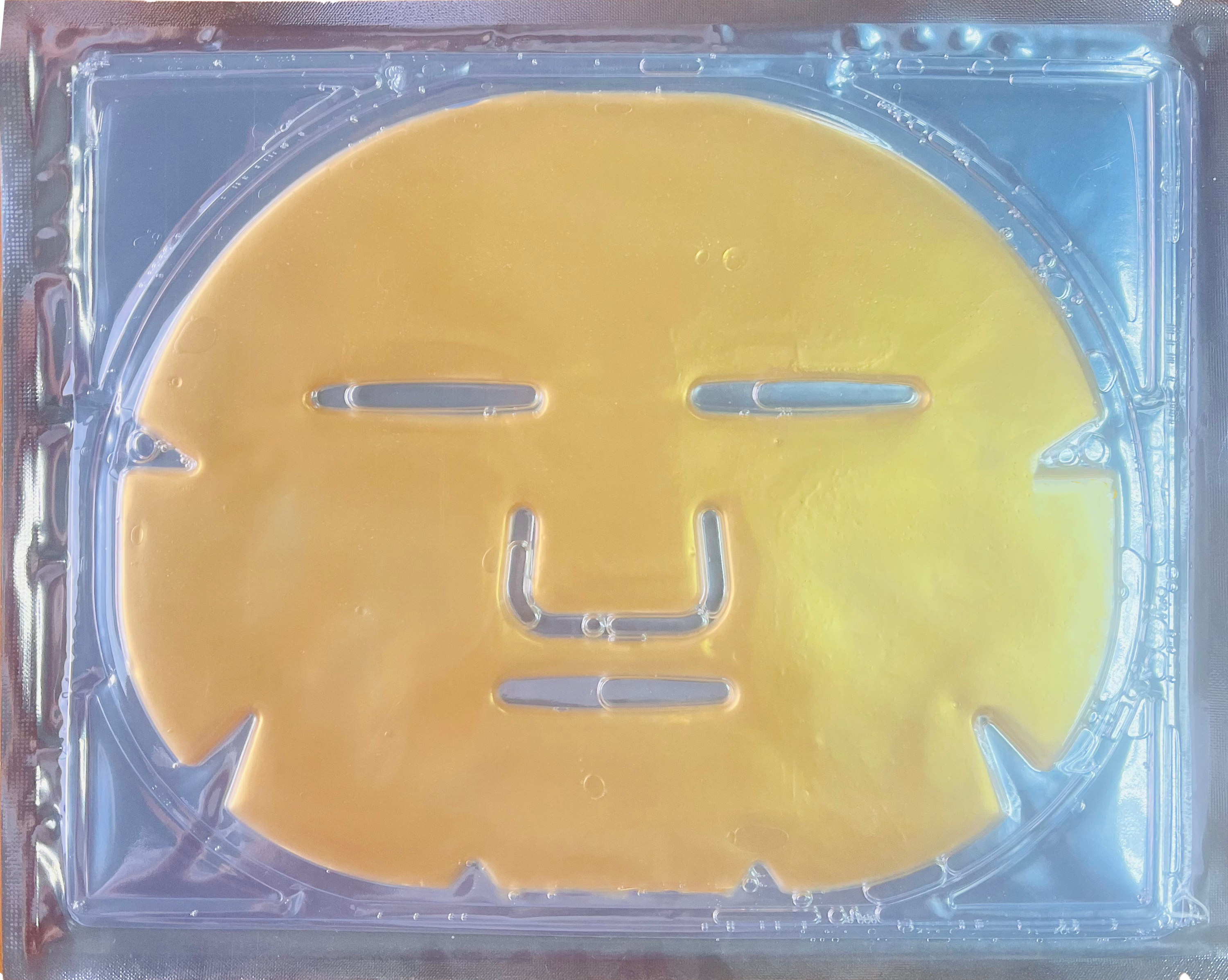 Masque d'or de sac en plastique