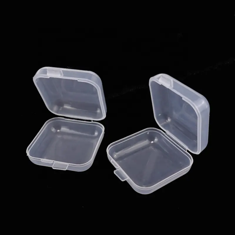Vente en gros de petites boîtes carrées en plastique transparent à clapet pour le stockage des accessoires Conteneur d'emballage de bouchons d'oreille pour bijoux