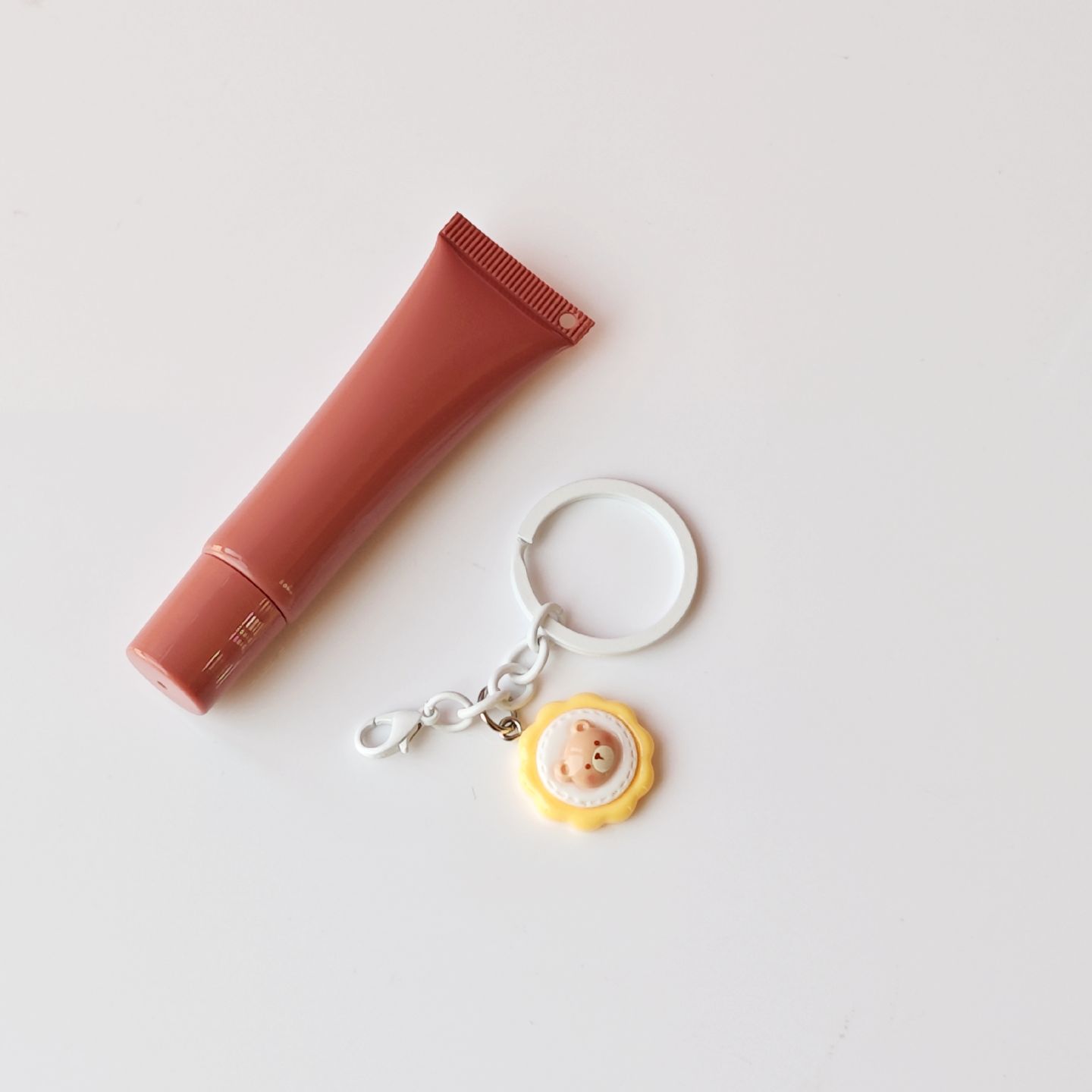 Brown + white keychain + little bear