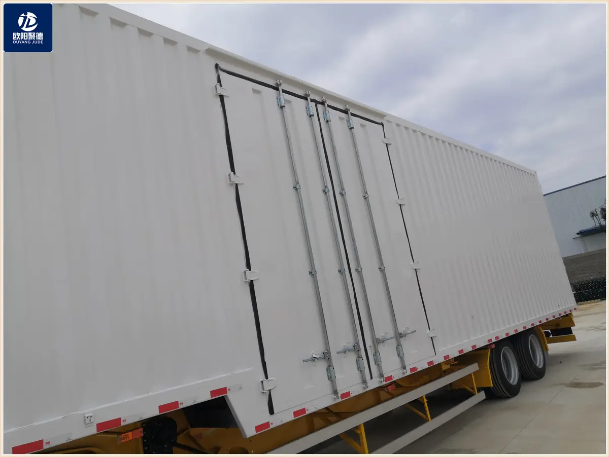 OYJD Trailers new Transnational transport 40ft flatbed trailer van cargo box with 3 brand axles skeleton Chassis semitrailer