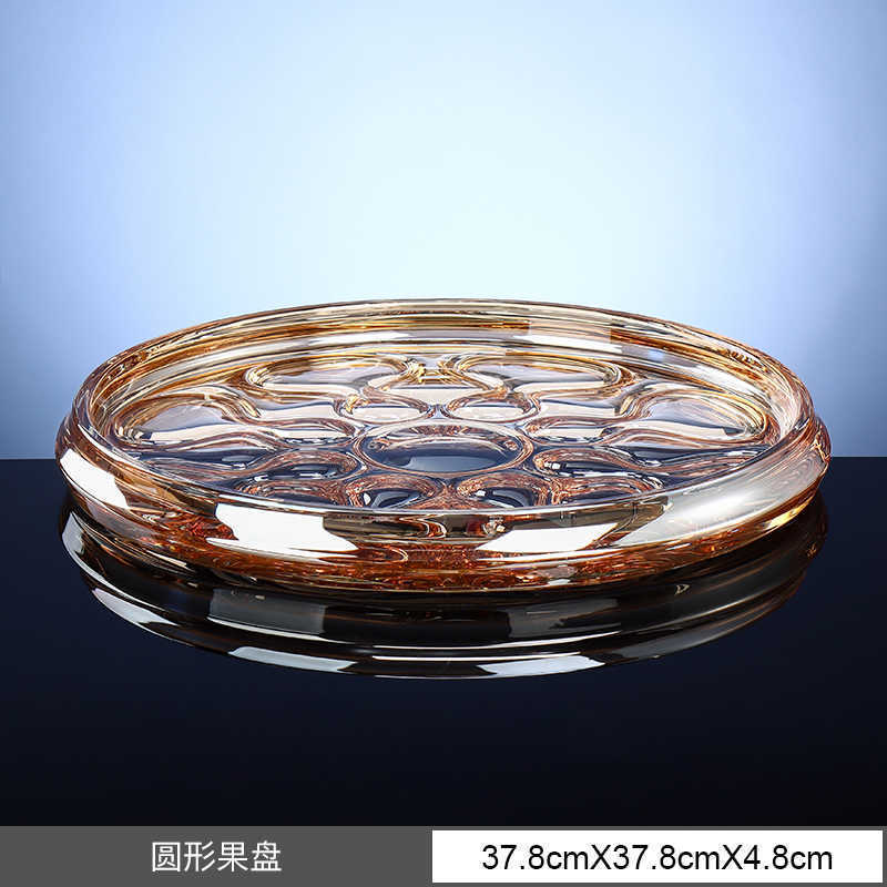 Ocean-shaped round amber fruit platter