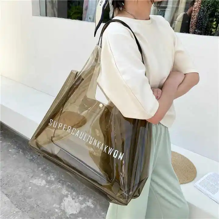 Commercio all'ingrosso di colore solido impermeabile grandi borse da spiaggia personalizzate stampa Logo trasparente in Pvc borsa Tote trasparente con bottone