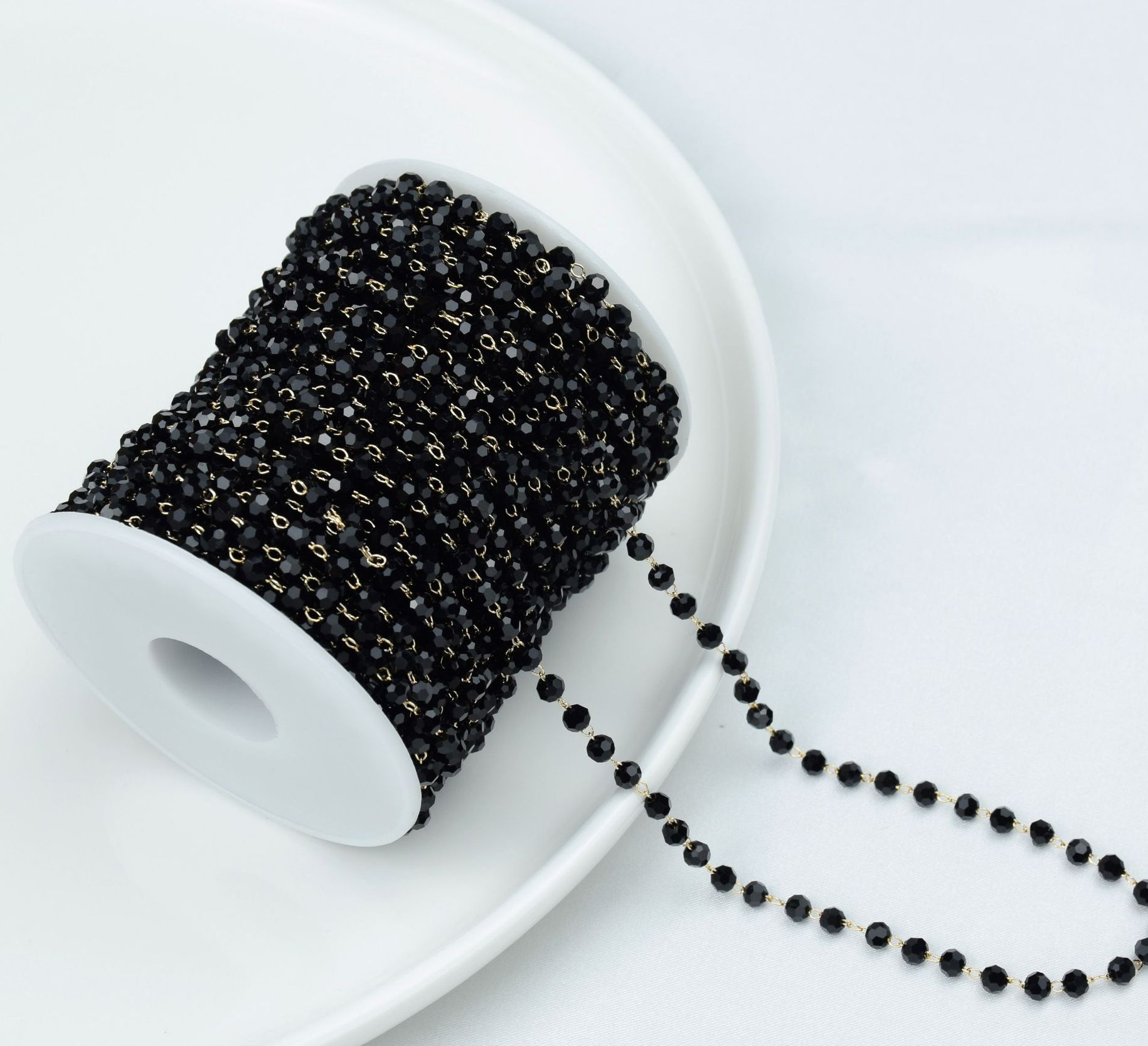 Black faceted-4mm
