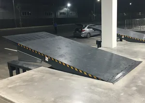 Rampa de muelle de carga Nivelador de muelle eléctrico telescópico con labio retráctil adecuado para una bahía de carga de mayor alcance - Product Image 6