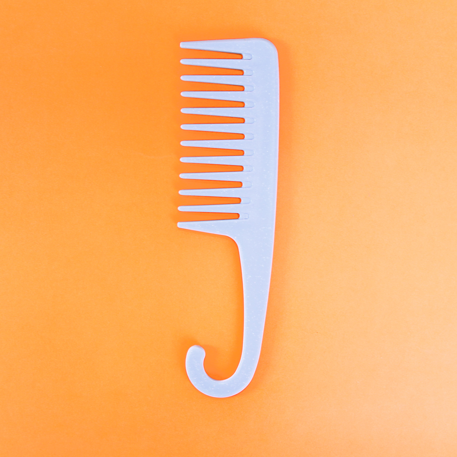 Silver-wide-tooth comb