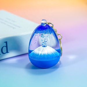 Areias Flutuantes Erupting Volcanic Bubble Sandglass Liquid Motion Bubbler Snowball Water Globe Keyring em Egg <span class=keywords><strong>Shape</strong></span>