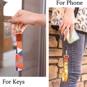Wholesale Custom Pu Leather Phone Wristlet Lanyard Key Chain Short Hand Wrist Strap Keychains