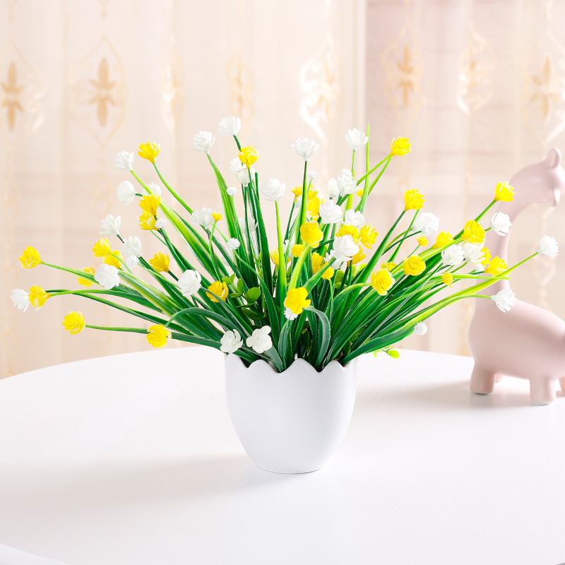 Aliento de bebé, flores de Milán, amarillo y blanco.