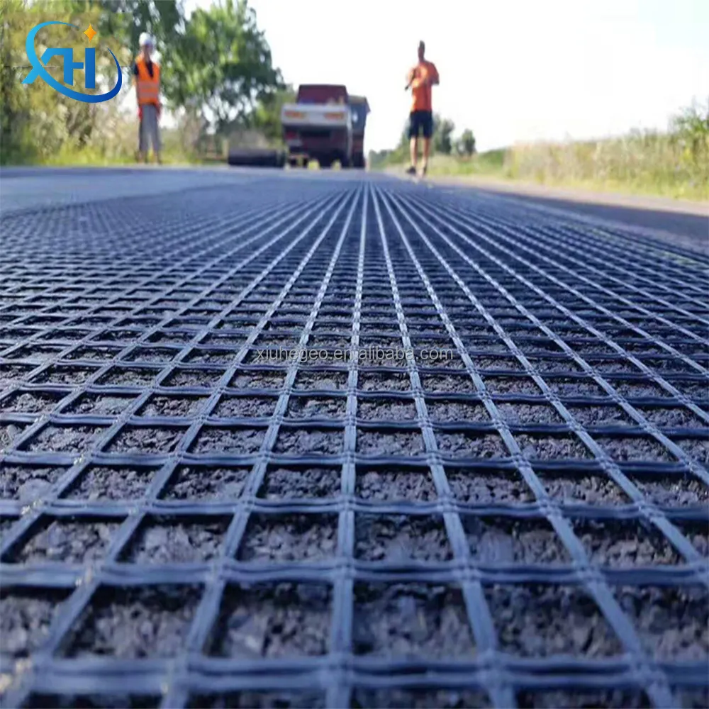 Ad alta resistenza in fibra di basalto maglia Geogrid rivestito bitume 20-200kn/m in fibra di vetro Geogrid 60 80kn strada e pavimentazione del ponte