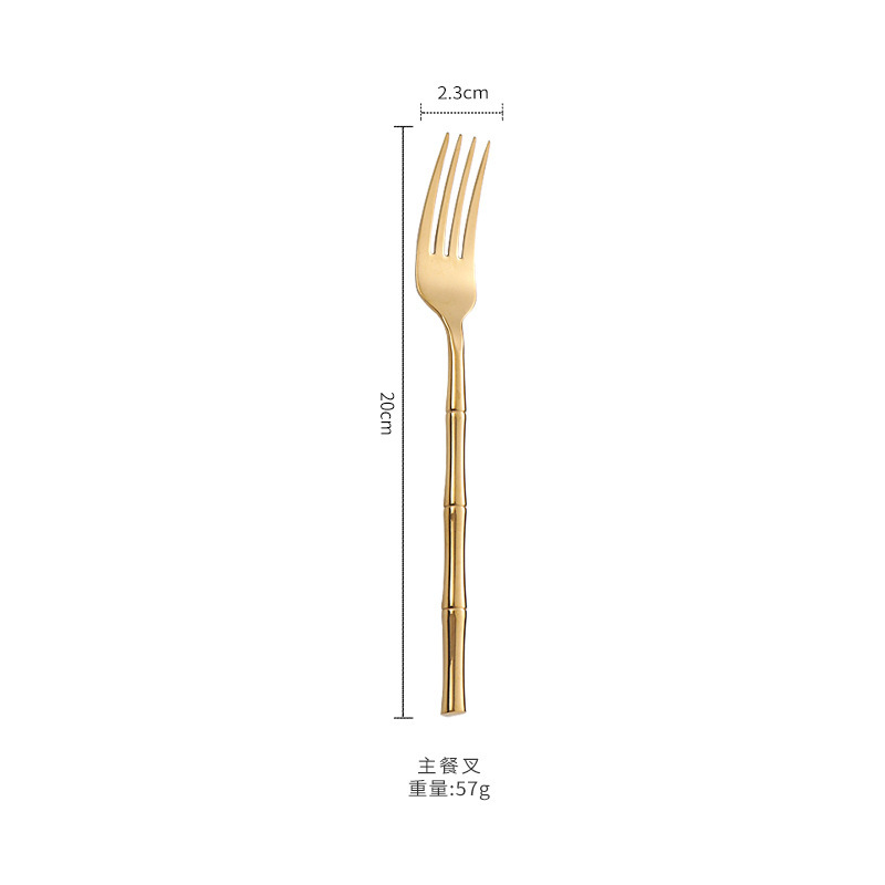 Tenedor de mesa dorado
