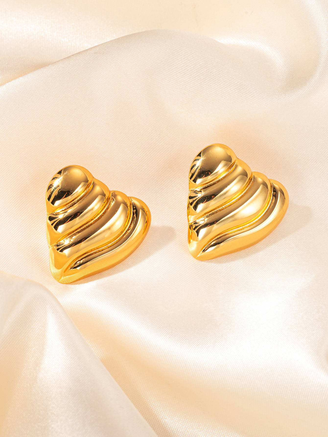 Boucles d'oreilles en forme de corne de taureau