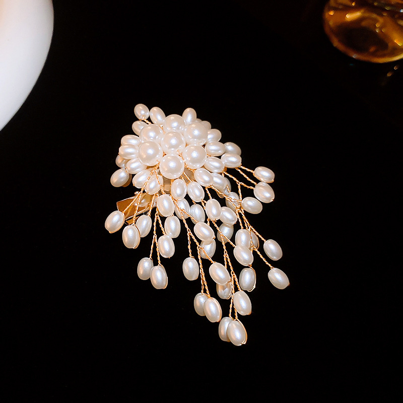142# broche-gland doré
