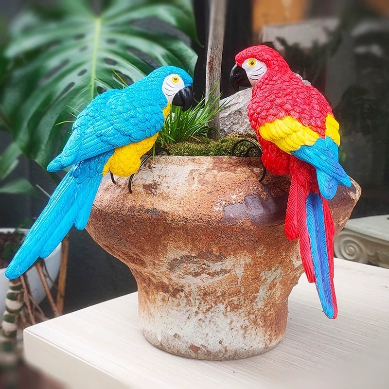 Bleu et rouge, paire de perroquets bleu gauche-rouge droit avec griffes