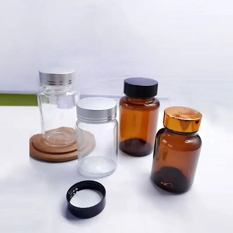 Hersteller Direkt vertrieb gelbbraune Kapsel flasche mit Deckel Pulver Glasflasche Gesundheits produkte
