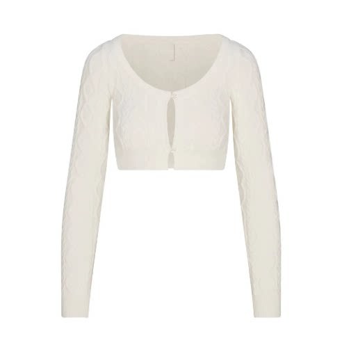 White tight-fitting cardigan