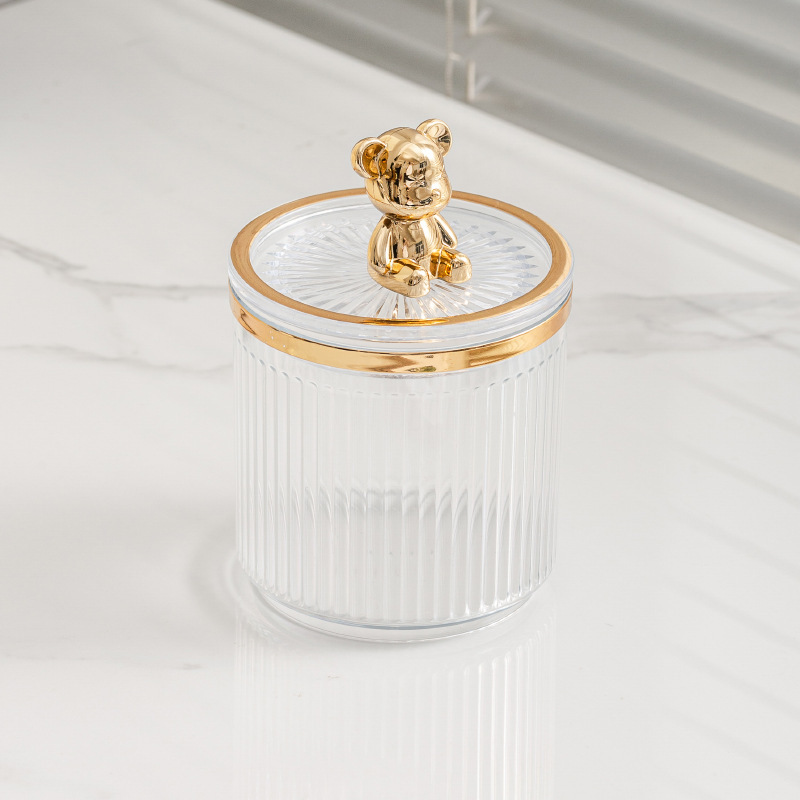 Transparente con osito de peluche dorado.