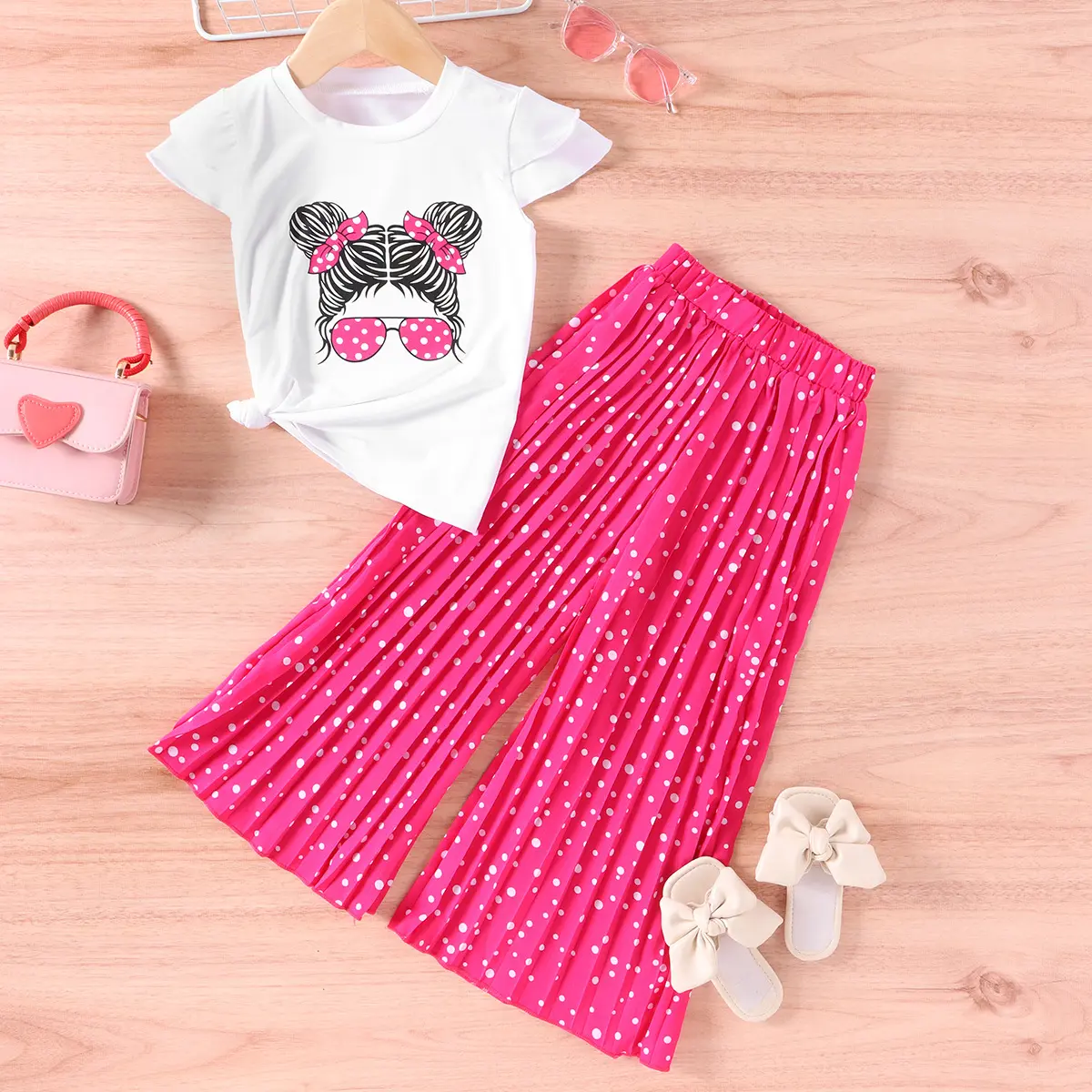 Ropa de niña dulce Conjuntos de ropa para niñas Cabeza de personalidad de dibujos animados Manga corta + Pantalones de pierna ancha Conjunto informal de dos piezas para niñas