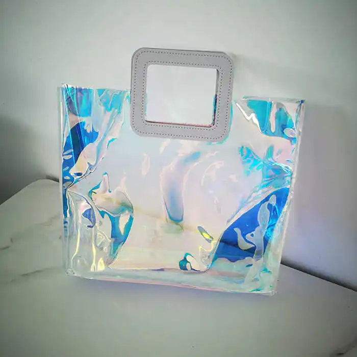 Logo cetak kustom tahan air grosir tas Tote tangan hadiah Laser bening holografik PVC baru tas pantai transparan untuk wanita