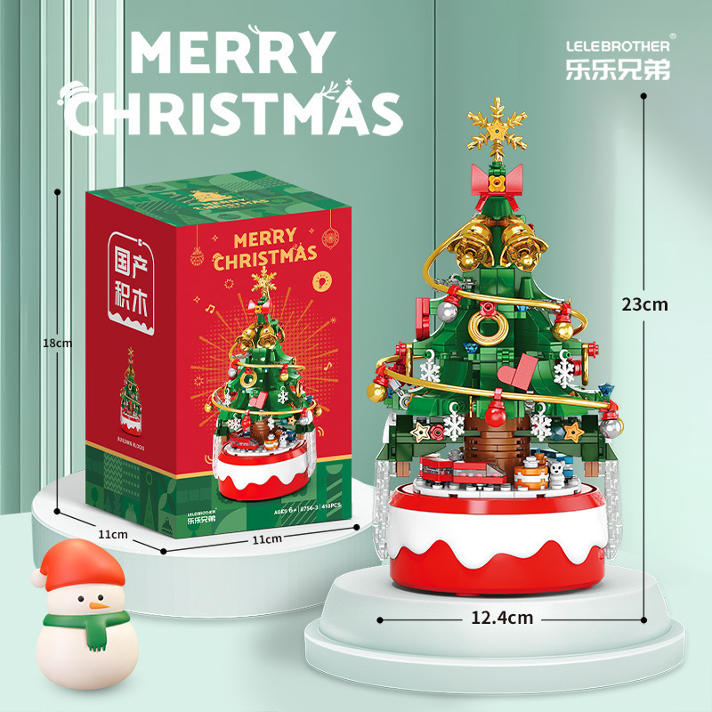 Red and green Christmas tree music box with lights