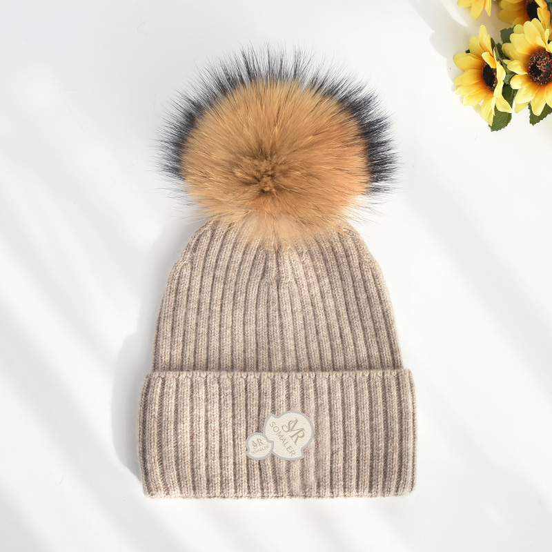 Camel with brown pom
