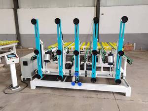Máquina de descarga de carga de vidrio controlada por PLC con componente de núcleo de motor para línea de molienda de doble cara
