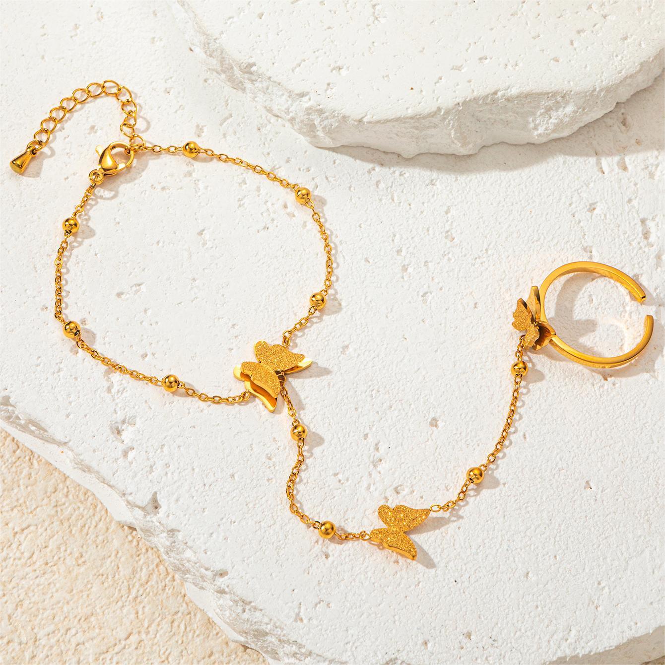 Bracelet doigt papillon en acier titane