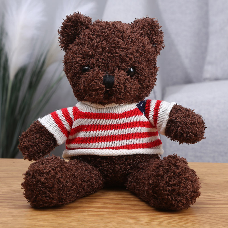 orso bruno con bandiera americana