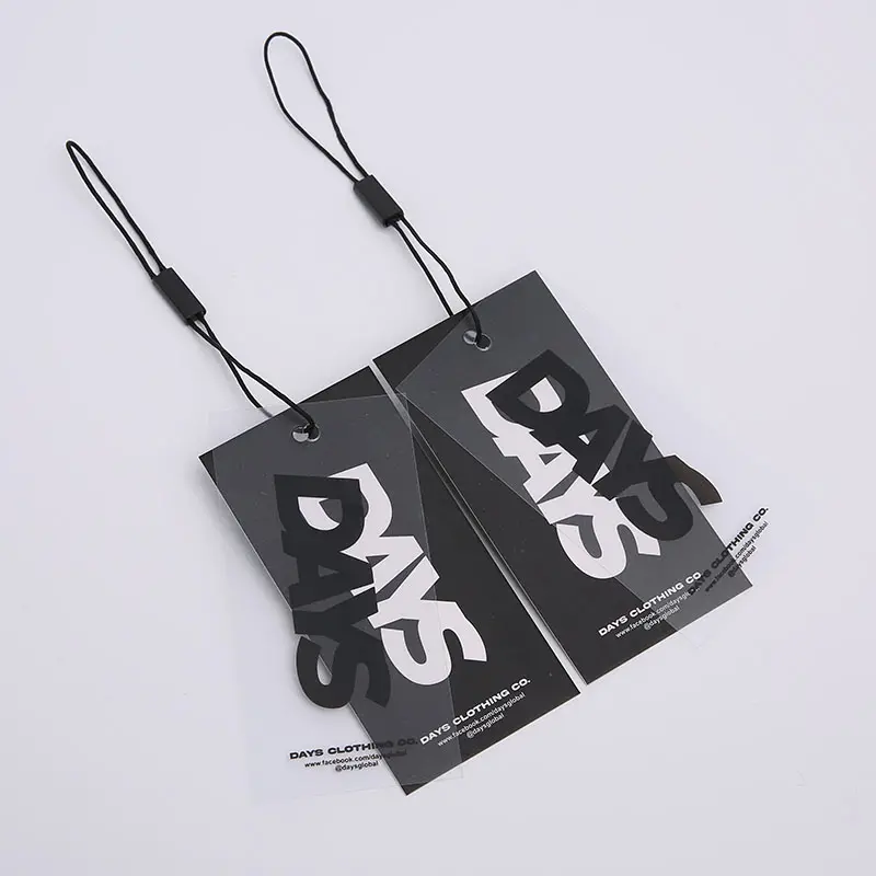 Cartellini neri di lusso personalizzati per abbigliamento etichetta altalena in carta doppia spessa abbigliamento cartellini in PVC trasparente con cordino e spilla