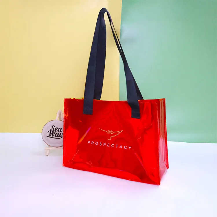 Vente en gros de sacs à provisions transparents et imperméables avec logo personnalisé sac fourre-tout en PVC transparent avec poignées sacs à main cosmétiques pour femmes