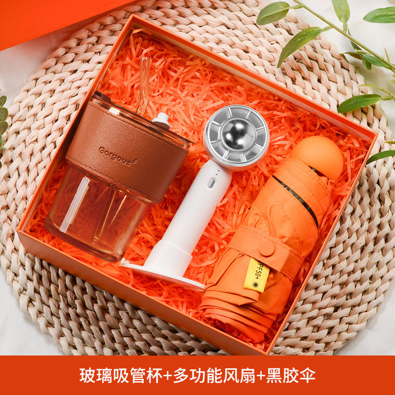 Coffret cadeau : tasse à paille en verre orange, éventail vortex et parapluie.