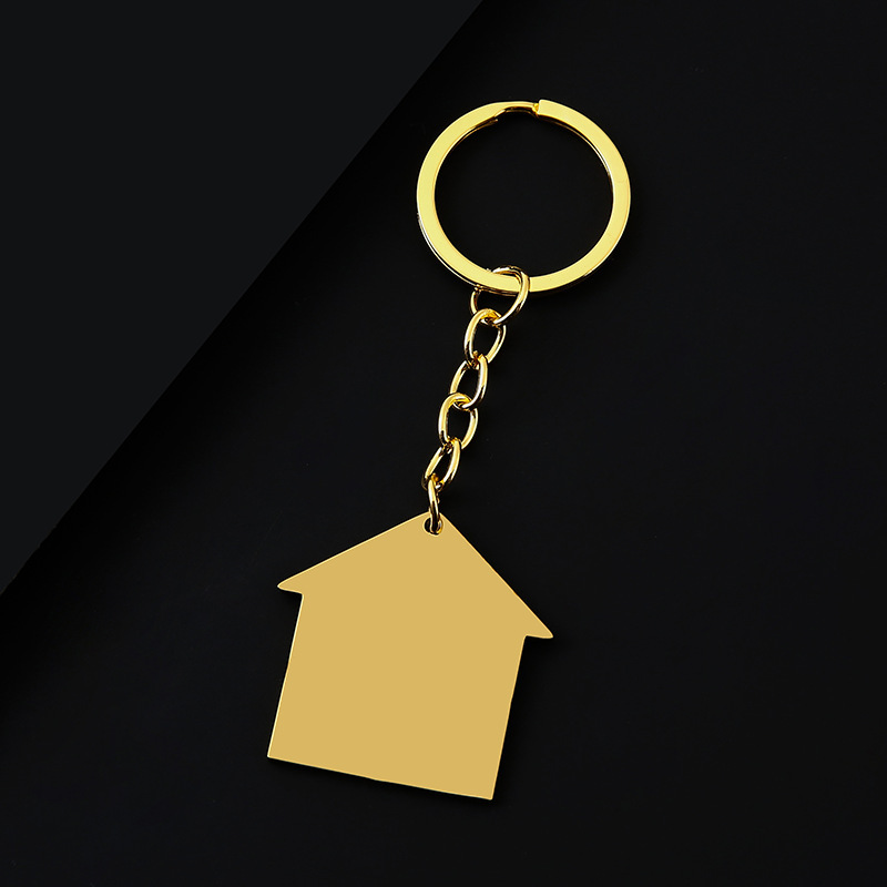 Porte-clés doré avec trou de 38377 mm pour maison.