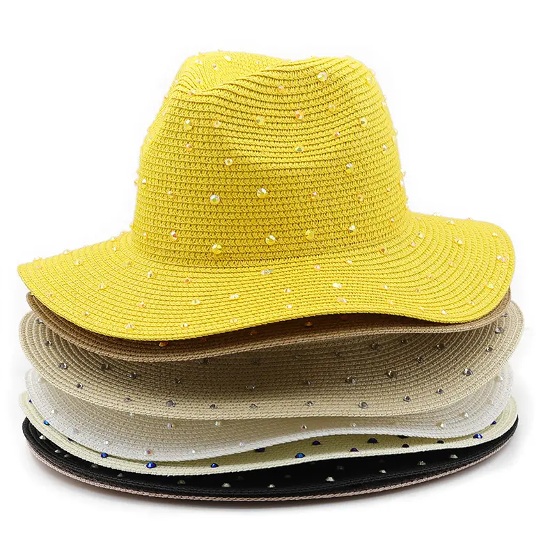 Venta al por mayor de ala ancha señoras de moda al aire libre vacaciones playa sombrero de paja hombres Primavera Verano suave hierba tejida protector solar Panamá sombreros
