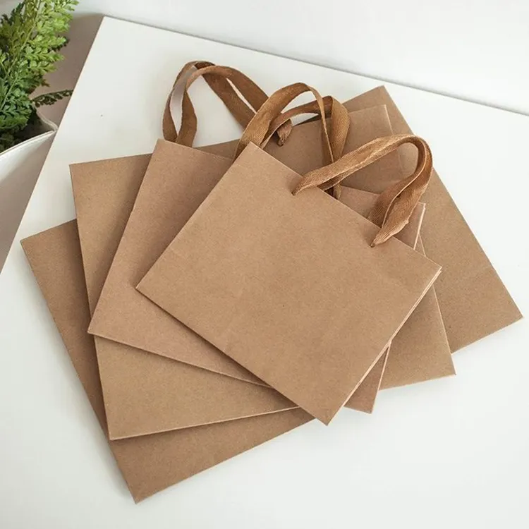 Saco de papel Kraft marrom reciclável com alça de corda para compras, saco de papel Kraft com alça plana para seu logotipo