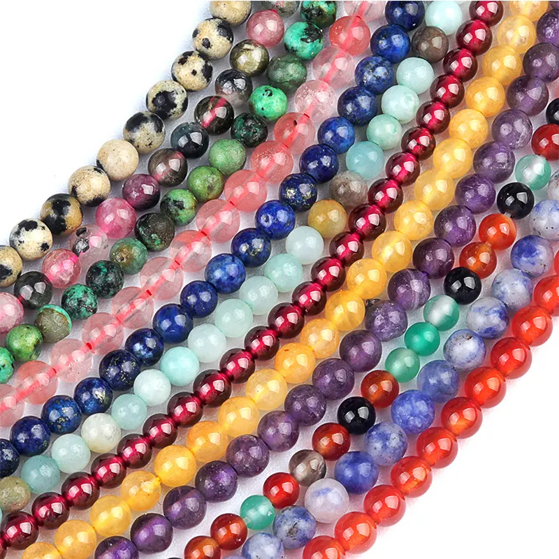 Collana di gioielli con bracciale semi-prezioso colorato rotondo che fa altre perle di pietra naturale sciolte per la creazione di braccialetti di gioielli