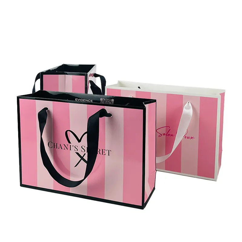 Custom Paper Bags With Logo Luxury Shopping Clothing Packaging Gift Paper Bag Hot Stamping CMYK Recyclable Paper Bag