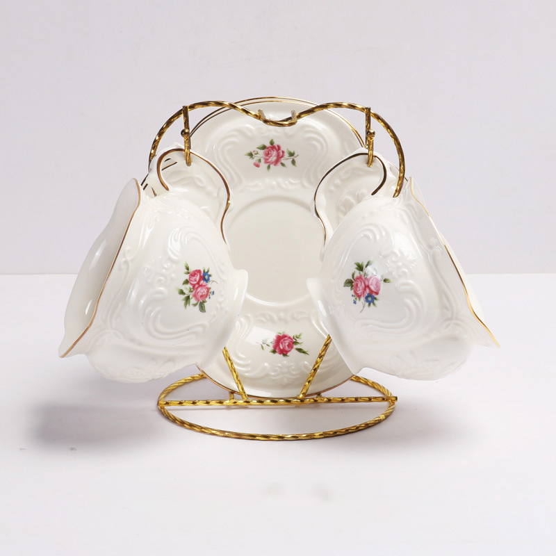 white-double cup and saucer