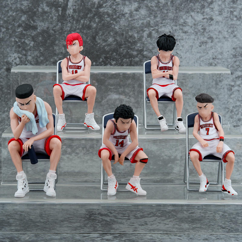 A large white-clad stool and a Slam Dunk master