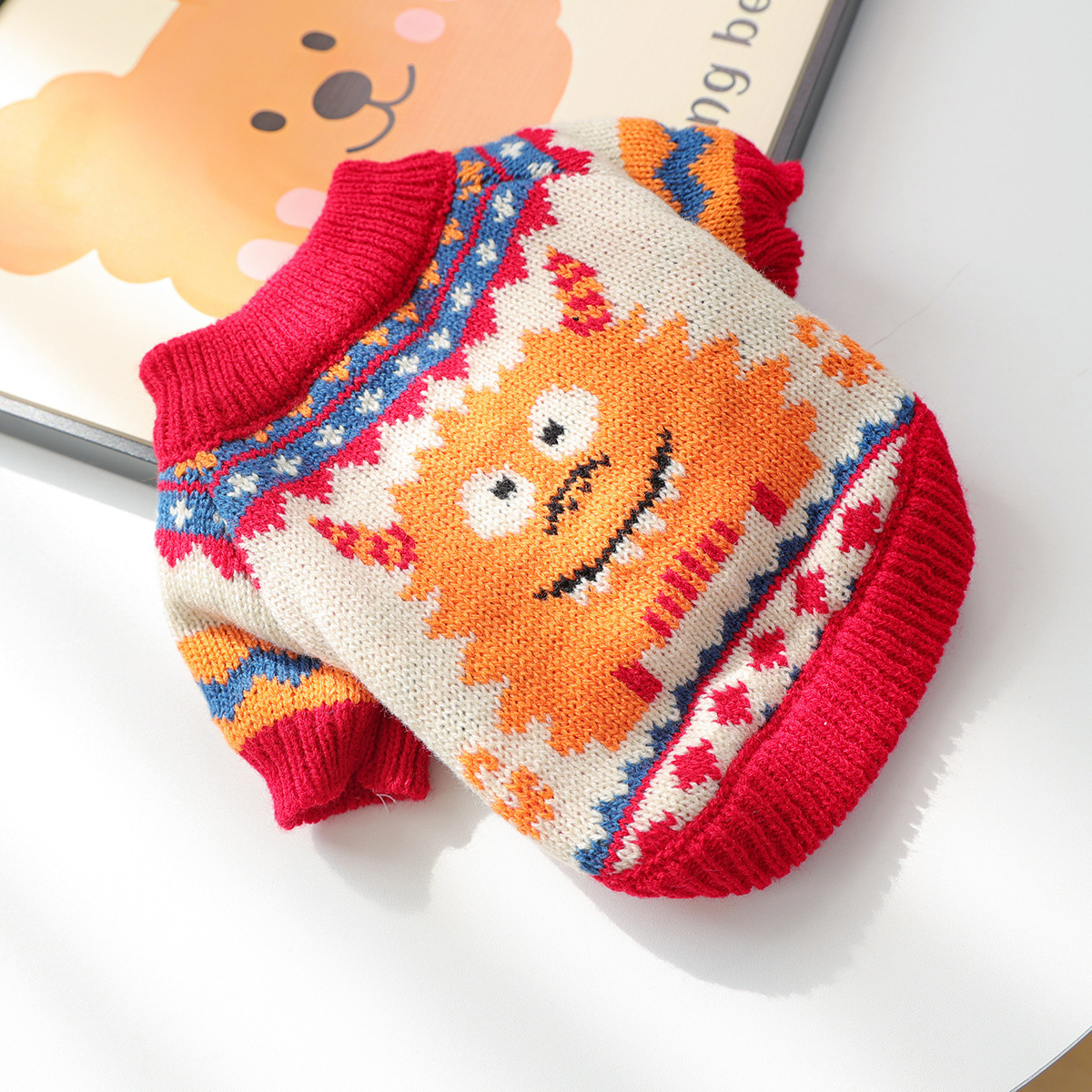 Orange monster sweater