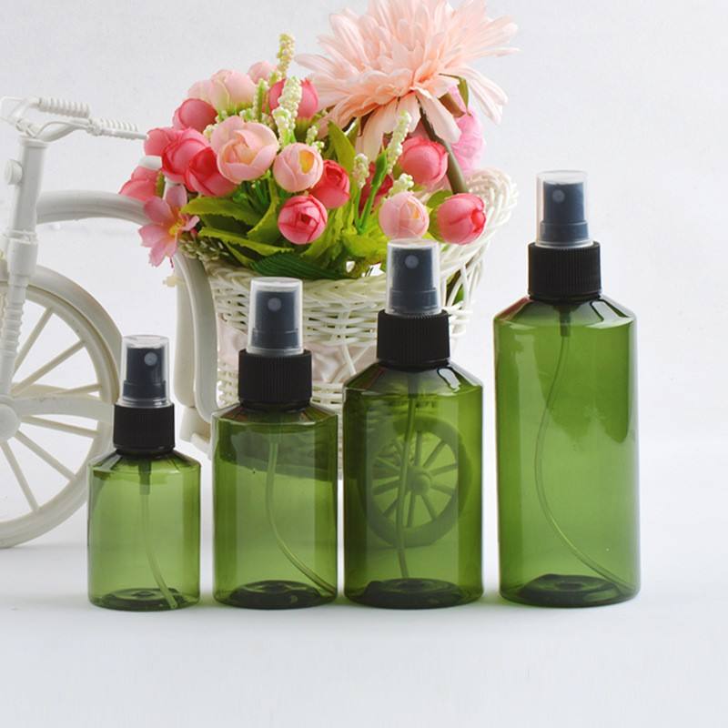 Green bottle with Transparent lid and black nozzle