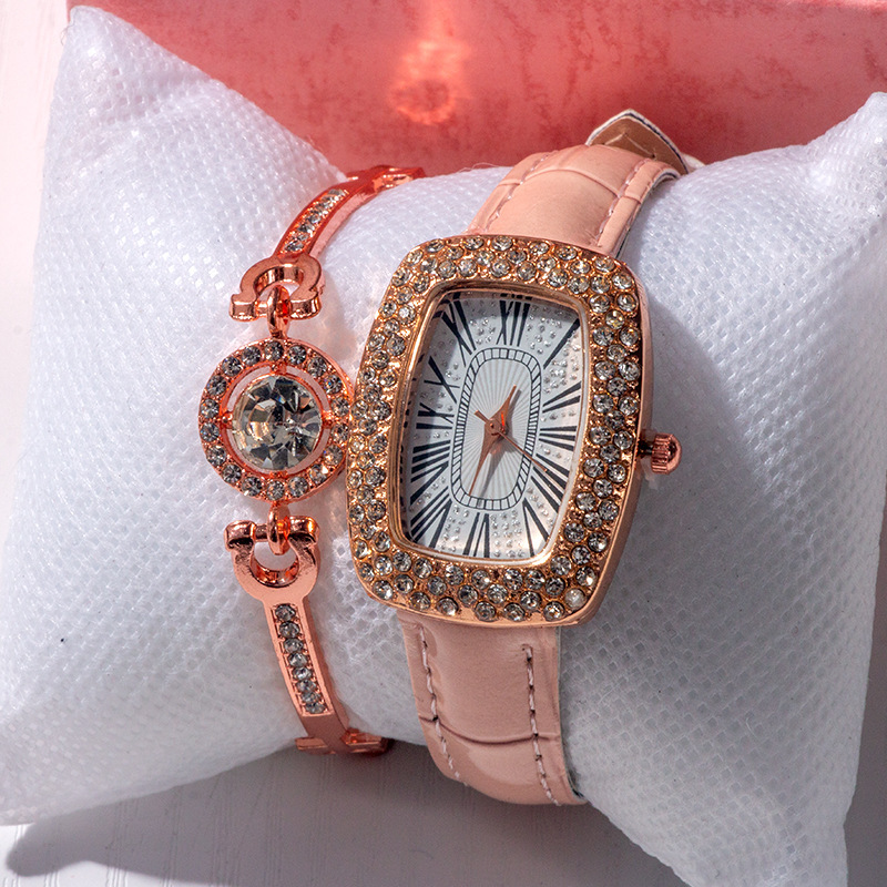 Reloj rosa + pulsera + caja