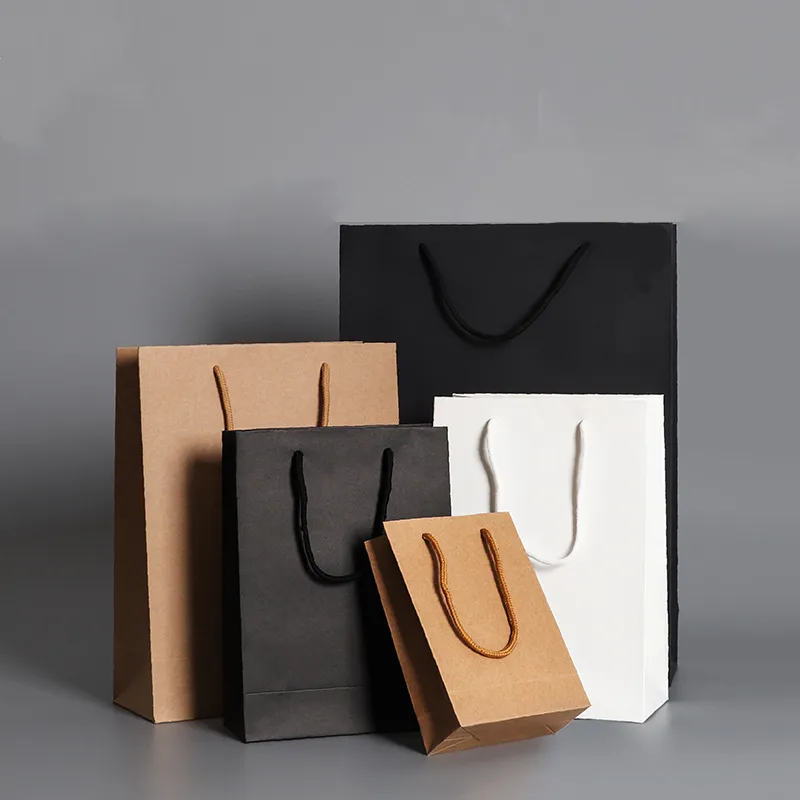 Sacchetti regalo di carta bianca rosa nera con manico in carta riciclabile sacchetti di imballaggio per abbigliamento scarpe Custom Shopping Paper Bag con Logo