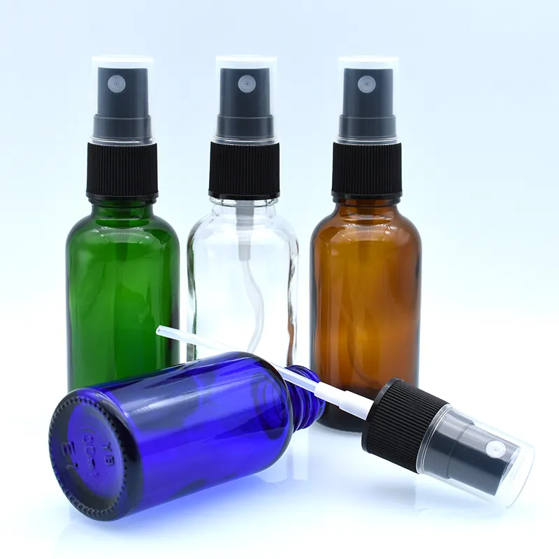 Mini botella de vidrio de lujo para perfume, con tapas de pulverización para cosméticos, color verde, azul y ámbar, 5ml, 10ml, 15ml, 20ml, 30ml, 50ml, 100ml, barata