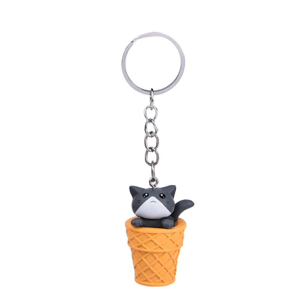 Gato gris + llavero cubo amarillo