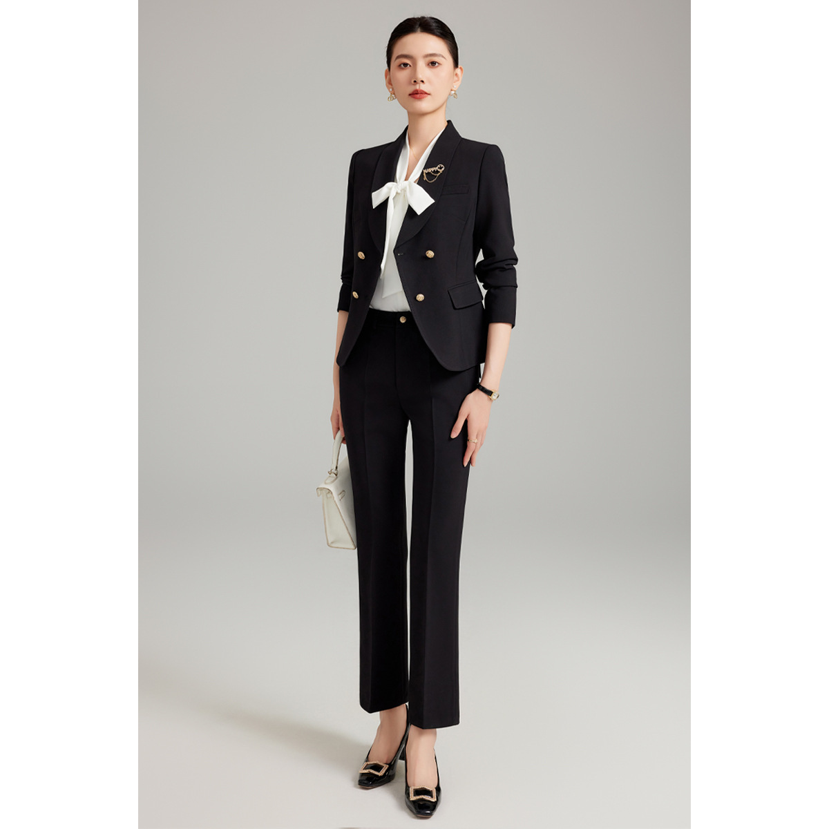 Black suit with slightly flared trousers