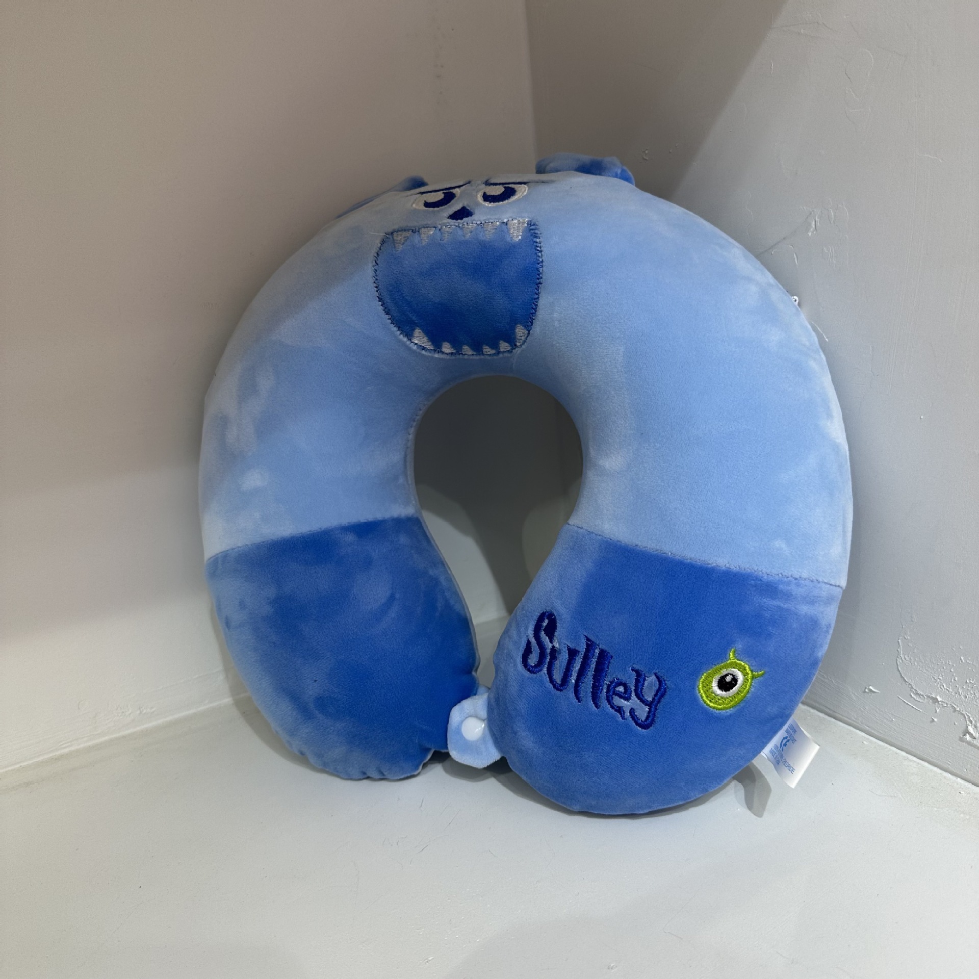 Forro de espuma viscoelástica con diseño de gato monstruo azul.
