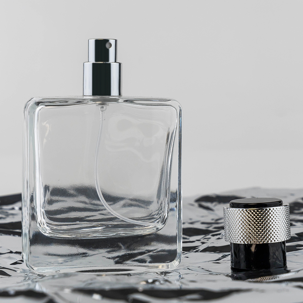 Bouteille en verre transparent + vaporisateur argenté + bouchon supérieur