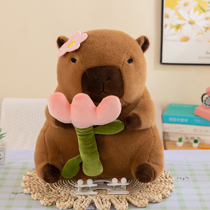 Tenant le capybara fleur